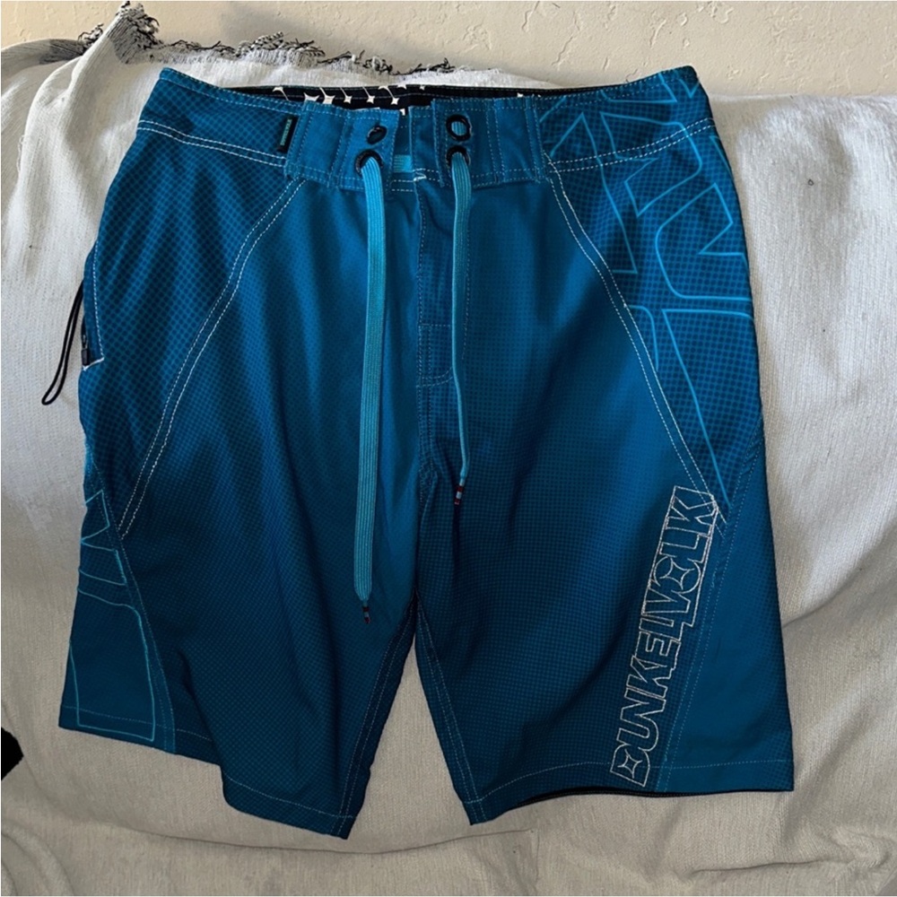 DunkelVolk blue white and black board shorts size 30 damaged zip pull